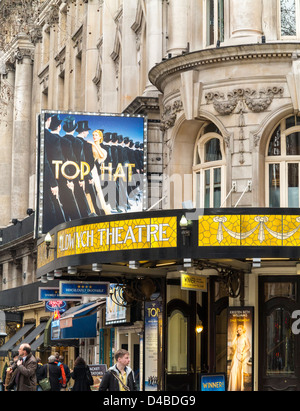 Exterior of the Aldwych Theatre with promotional signs for Top Hat ...