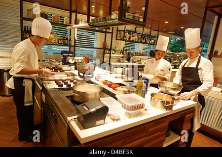 chefs in kitchen Stock Photo