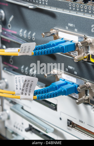 server with fiber optic cables in data center Stock Photo