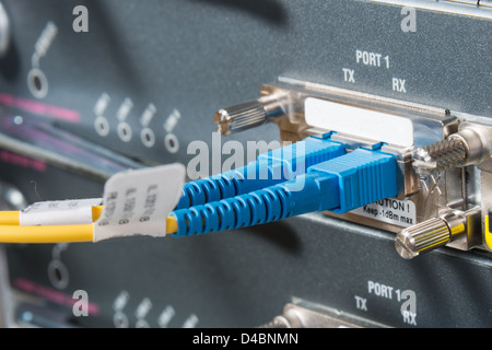 server with fiber optic cables in data center Stock Photo