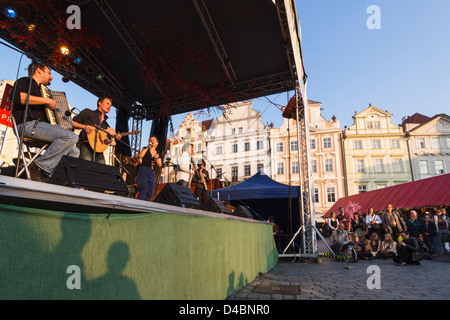 Breton folk band at the stage of the Easter Market in Old Town Sq. Prague, Czech Republic Stock Photo