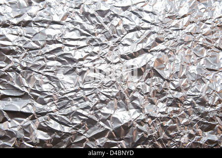 Wrinkled aluminum. Metalic background. Stock Photo