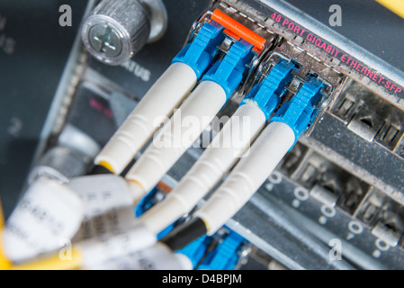 server with fiber optic cables in data center Stock Photo