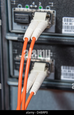 server with fiber optic cables in data center Stock Photo