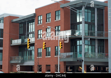 Modern apartment building at the corner of Main St and 11 MIle in Royal Oak, Michigan, USA, an urban suburb of Detroit, Mi. Stock Photo