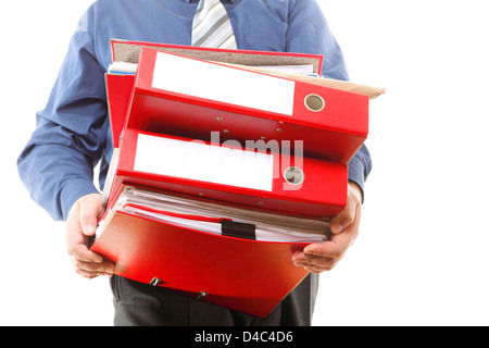 Man holding stack of folders. Pile with old documents and bills. Isolated on white background Stock Photo