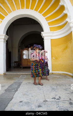 Church of San Francisco , Hermano Pedro de San Jose , Antigua , Guatemala mayans in typical dress Stock Photo