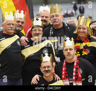 The picture shows fans of the German Handball team with artificial mustaches and crowns, in Bergen, Norway, 17 January 2008. Germany will play Belarus in a first round group match on 17 January. Photo: Jens Wolf Stock Photo