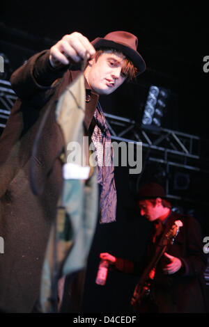 Lead singer Pete Doherty of the British band Babyshambles holds a piece of clothing in his hand prior to a concert at the Live Music Hall in Cologne, Germany, 22 January 2008. Photo: Joerg Carstensen Stock Photo