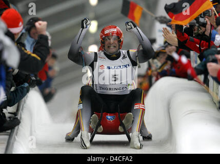 German lugers Andre Florschuetz (front) and Torsten Wustlich cheer after winning the double final at the Luge World Championship in Oberhof, Germany, 27 January 2008. It is their third World Championship victory after their triumph in 2001 and 2005   Photo: THOMAS EISENHUTH Stock Photo