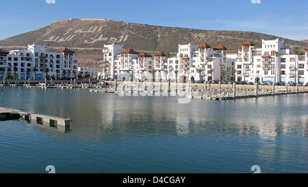 View over Marina Agadir on a hillside reading the Arab words for God (top), homeland (L) and King (R) in Agadir, Morocco, 11 December 2007. Photo: Lars Halbauer Stock Photo