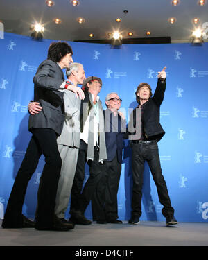 The Rolling Stones Ron Wood, Charlie Watts, Keith Richards and Mick Jagger (L-R) and director Martin Scorsese (2-R) pose during the photo call for 'Shine A Light' at the 58th Berlin International Film Festival in Berlin, Germany, 07 February 2008. Martin Scorsese's concert movie 'Shine a Light' starring the Rolling Stones will kick off this year's festival. 21 films take part in th Stock Photo