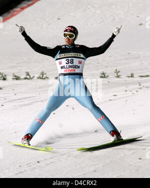 Norwegian Bjoern Einar Romoeren lands a jump at the World Cup event at 'Muehlenkopfschanze' in Willingen, Germany, 17 February 2008. He won the competition with 286,6 points. Photo: UWE ZUCCHI Stock Photo