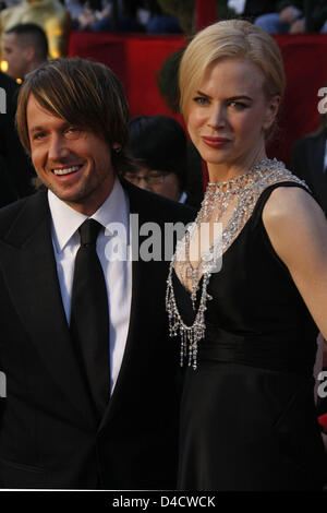 Australian actress Nicole Kidman (R) and her husband New Zealand country musician Keith Urban (L) arrive for the 80th Annual Academy Awards at the Kodak Theatre in Hollywood, CA, United States, 24 February 2008. The Academy Awards, popularly known as the Oscars, are presented by the Academy of Motion Picture Arts and Sciences (AMPAS) to recognize excellence of professionals in the  Stock Photo