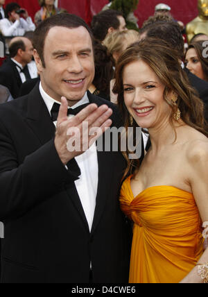 US actress Kelly Preston (R) and her husband US actor John Travolta (L) arrive for the 80th Annual Academy Awards at the Kodak Theatre in Hollywood, CA, United States, 24 February 2008. The Academy Awards, popularly known as the Oscars, are presented by the Academy of Motion Picture Arts and Sciences (AMPAS) to recognize excellence of professionals in the film industry, including d Stock Photo