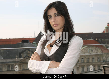 Lebanese actress and director Nadine Labaki smiles during a photo call for her film 'Caramel' in Munich, Germany, 25 February 2008. Labaki stars in the film, telling the story of five women searching for a small share of the big luck. The film will be shown at German cinemas from 3 April 2008 onwards. Photo: Ursula Dueren Stock Photo