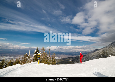 Downhill skiing in sunny frosty winter day Stock Photo