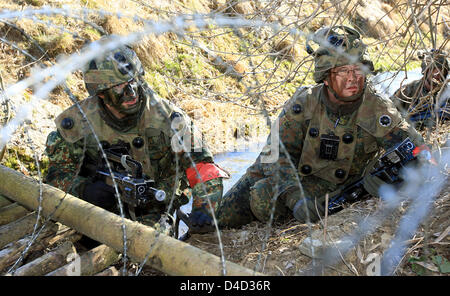 Bundeswehr soldiers shown in action during a field exercise of ...