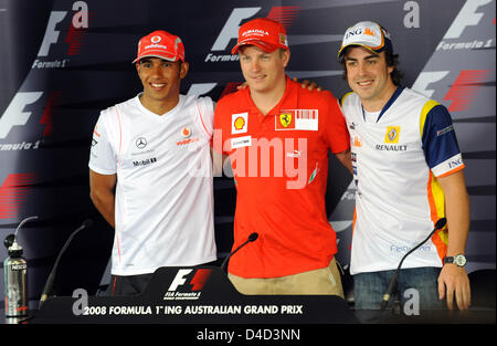 Formula One drivers Kimi Raikkonen of Scuderia Ferrari (C), Finnish 2007 Formula 1 World Champion, 3rd placed Spaniard Fernando Alonso of Renault F1 (R), and runner-up Briton Lewis Hamilton of McLaren Mercedes (L) after a press conference at Albert Park Circuit in Melbourne, Australia, 13 March 2008. The Formula 1 Australian Grand Prix will take place on Sunday 16 March. Photo:  Ge Stock Photo