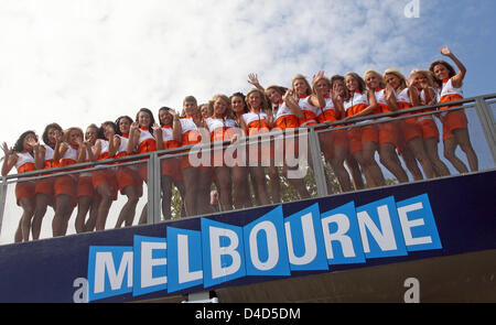 Grid girls line up before the start of the Formula 1 Australian Grand Prix at Albert Park circuit in Melbourne, Australia, 16 March 2008. British Lewis Hamilton of McLaren-Mercedes homed a pole-to-flag victory in an action-packed and crash-strewn Australian GP. Photo: Roland Weihrauch Stock Photo