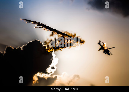 Israeli Air force Bell AH-1F Cobra helicopterEmitting anti-missile flares Stock Photo