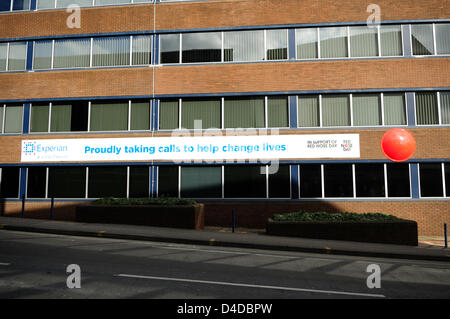 Nottingham, UK. 12th March 2013. Experian showing thier support for Red Nose Day.call center with banner and giant red nose.Talbot Street city. Credit:  Ian Francis / Alamy Live News Stock Photo