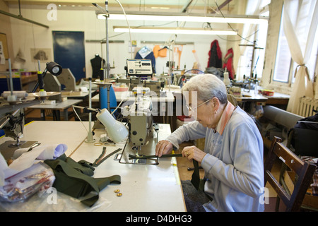 Jean Seddon (75) factory floor manager at British clothes manufacturer Private White V.C. in Salford, Manchester, England, UK Stock Photo