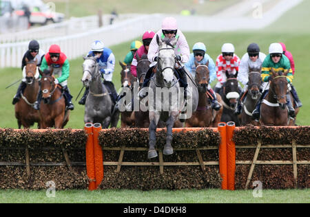 Cheltenham, UK. 12th March 2013. Champagne Fever ridden by Ruby Walsh leads over the first in the William Hill Supreme Novices Hurdle on Day one (Champion Day ) of the Cheltenham National Hunt Festival. Credit:  Action Plus Sports Images / Alamy Live News Stock Photo