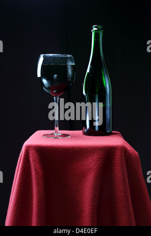 wine bottle and glass over black background Stock Photo