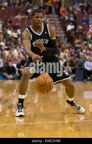 March 11, 2013: Brooklyn Nets shooting guard Joe Johnson (7) passes the ball during the NBA game between the Brooklyn Nets and the Philadelphia 76ers at the Wells Fargo Center in Philadelphia, Pennsylvania. The Philadelphia 76ers beat the Brooklyn Nets, 106-97 Stock Photo