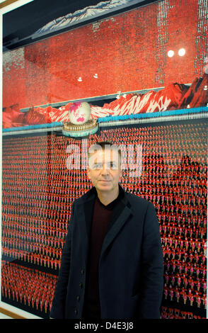 German photographer Andreas Gursky poses with his photography 'Pyongyang IV' (2007) during a photocall at Moenchehaus-Museum in Goslar, Germany, 10 October 2008. Gursky accepted Goslar's prestigious contemporary art prize 'Kaiserring' on 11 October at Goslar's historic property 'Kaiserpfalz'. Gursky became world-famous with his large-sized photographies, said the jury. Photo: HOLGE Stock Photo