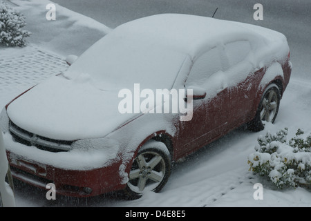 Dodge Car Snowed covered car snowing with snow south east Stock Photo