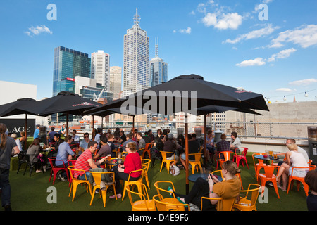 People relaxing at Rooftop Bar at Curtain House. Melbourne, Victoria, Australia Stock Photo