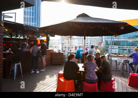 People relaxing at Rooftop Bar at Curtain House. Melbourne, Victoria, Australia Stock Photo