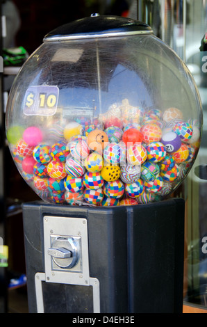 Rubber balls in a gumball vending machine in Oaxaca, Mexico. Stock Photo