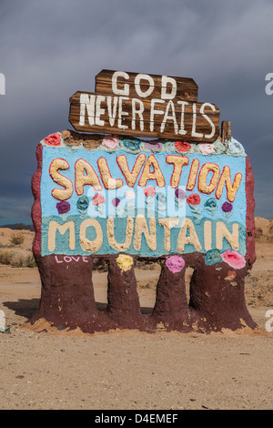 The welcoming sign to Salvation Mountain, a unique piece of primitive art on a grand scale created by Leonard Knight using house paint. Stock Photo
