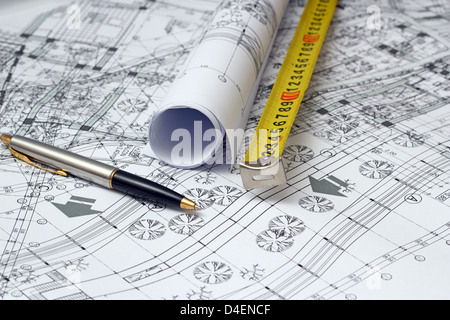 architectural sketches printed on white paper and drawing instruments Stock Photo