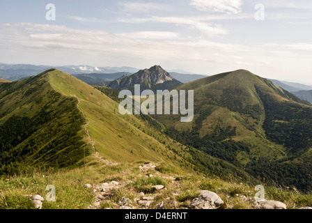 Steny, Stoh and rocky Velky Rozsutec hill on the background from Hromove hill in Krivanska Mala Fatra mountain range in Slovakia