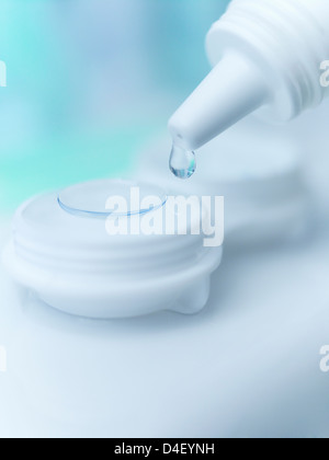 Close up of saline dropping on contact lens Stock Photo