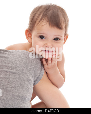 Funny baby girl on mum's hands. Isolated on a white background. Stock Photo