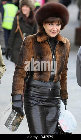 Cheltenham, UK. 13th March 2013. Ladies arrive at the racecourse in fur and leather during day two (Ladies Day) of the Cheltenham National Hunt Festival.  Credit:  Action Plus Sports Images / Alamy Live News Stock Photo