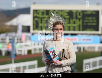 Cheltenham, UK. 13th March 2013. Ladies make a real effort despite the cold during day two (Ladies Day) of the Cheltenham National Hunt Festival.  Credit:  Action Plus Sports Images / Alamy Live News Stock Photo