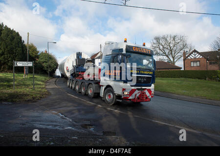 Danbury, Essex. 13th March 2013. Two sections of a tower negotiate the S bends in Danbury, Essex. The parts are being taken to a new windfarm that is currently under construction on the Dengie Peninsula at Bradwell. Credit:  Allsorts Stock Photo / Alamy Live News Stock Photo