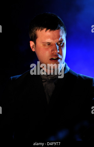 BARCELONA, SPAIN - MAR 15: Harry McVeigh, frontman of White Lies band performs at Apolo on March 15, 2011 in Barcelona, Spain. Stock Photo