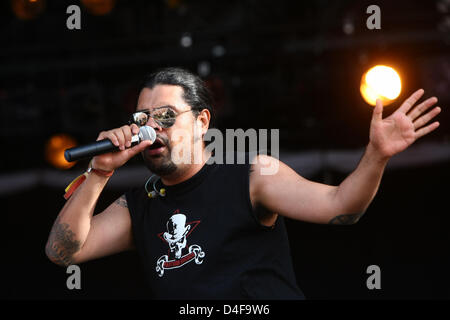 Front man of the band 'Panteon Rococo' Luis Roman Ibarra alias Dr. Shenka performs at the 'Southside' music festival 2008 in Neuhausen ob Eck, Germany, 20 June 2008. The start of the open air festival in bright sunshine attracted 45,000 visitors. The styles of music range from reggae to hip-hop and punk. The festival will take place till 22 June 2008 in Neunhausen ob Eck. Photo: Ma Stock Photo