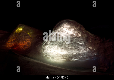 A Long Exposure of light seeping through the snow at the Hotel of Ice at Balea Lac in the Carpathian Mountains, Transylvania, Romania Stock Photo