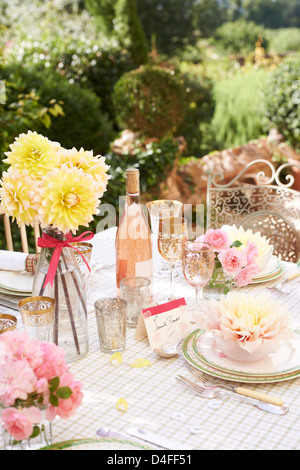 Table set for wedding reception outdoors Stock Photo