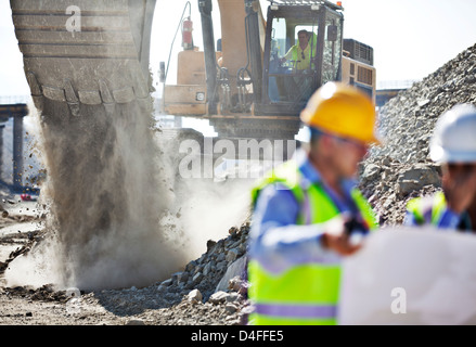 Digger working in quarry Stock Photo