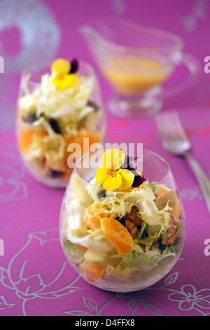 Escarole salad with tangerines. Recipe available. Stock Photo