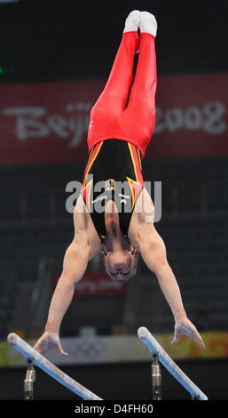 German Fabian Hambuechen exercises on the parallel bars during an artistic gymnastics practise session in the National Indoor Stadium, Beijing, China, 06 August 2008. Photo: Frank May dpa ###dpa### Stock Photo